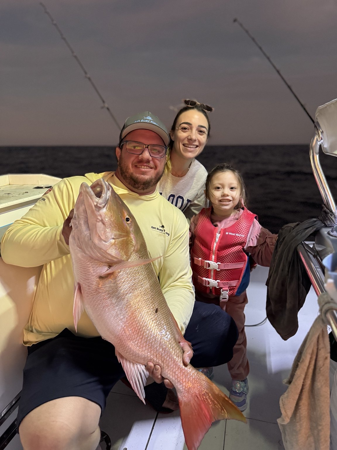 Family nighttime mutton snapper fishing in South Florida
